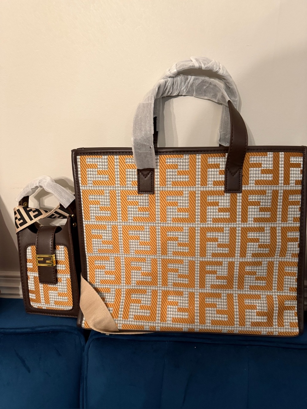 Large gold/ gray tote with additional small phone pouch